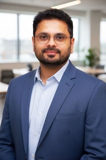 Pratik in grey suit